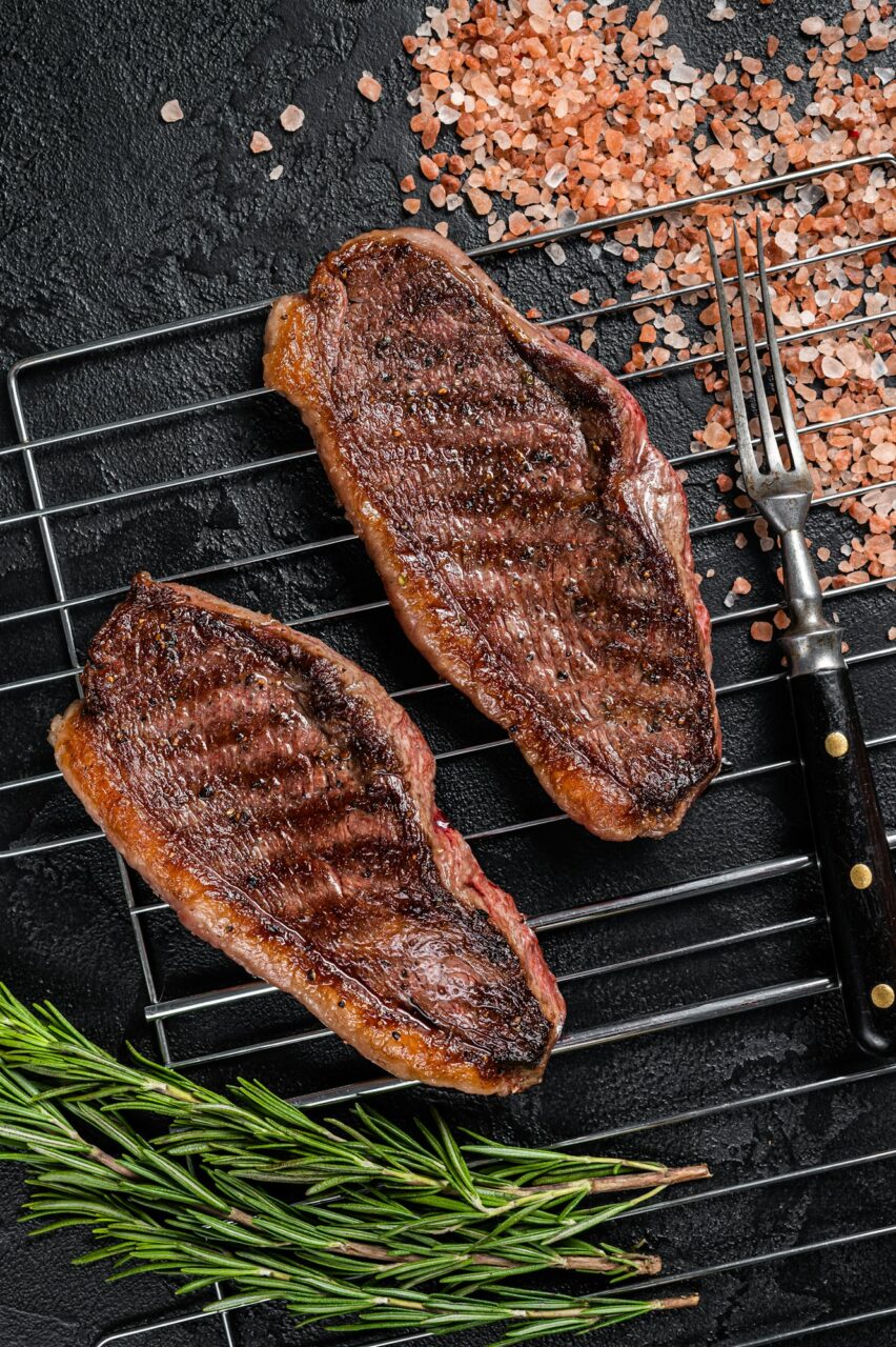 bbq-grilled-cap-rump-or-top-sirloin-beef-steak-fried-meat-on-grill-black-background-top-view.jpg